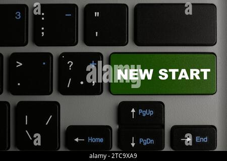Button with text NEW START on modern computer keyboard, closeup Stock Photo