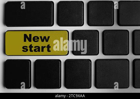 Button with text NEW START on modern computer keyboard, closeup Stock Photo