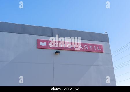 Scholastic sign on its warehouse building in Phoenix, AZ, USA Stock Photo