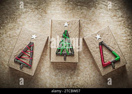 Christmas gift boxes on crumpled waste paper Stock Photo