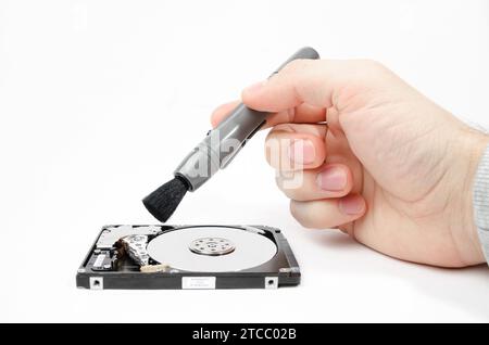 Disassembled hard disc cleaning brush isolated on white Stock Photo