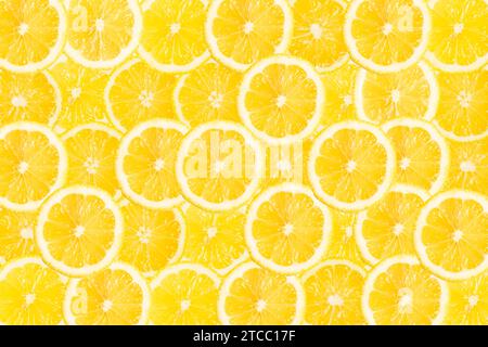 Abstract background with citrus-fruit of lemon slices. Close-up. Studio photography. Many slices Stock Photo