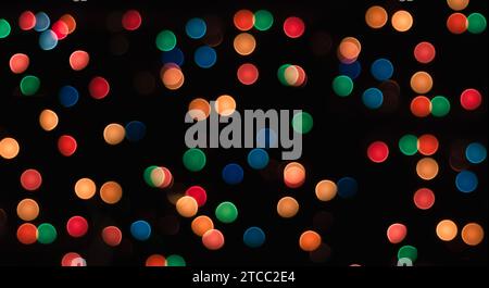 Multicolored circles on a black background with blur abstract pattern Stock Photo