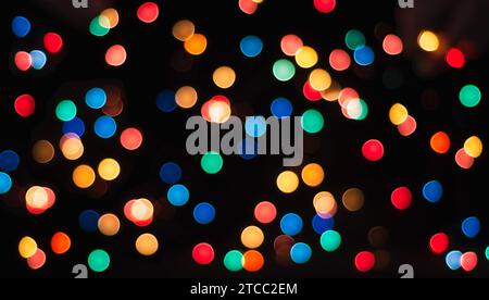 Multicolored circles on a black background with blur abstract pattern Stock Photo