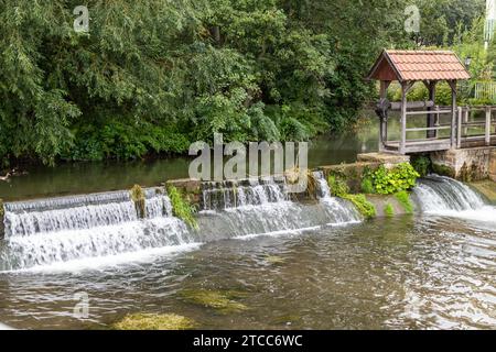 Weir with waterfall on the river Gera in Erfurt, Thuringia Stock Photo
