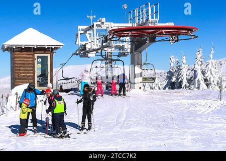 Kopaonik, Serbia, January 22, 2016: Ski resort and chair lift, slope view and skiers Stock Photo