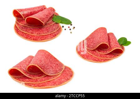 Tasty salami slices isolated on white background. Stock Photo
