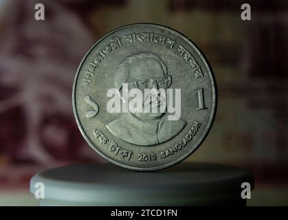 One Taka A close-up of a Bangladesh one taka coin depicting Sheikh Mujibur ...