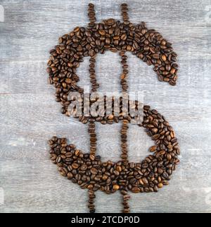 Dollar sign, formed with roasted coffee beans, coffee price Stock Photo