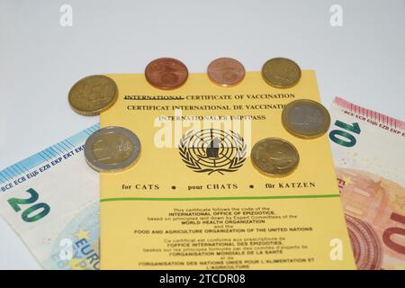 international certificate of vaccination for cats and money, symbol picture Stock Photo