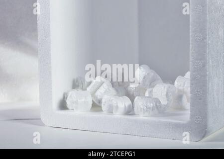 Box with white foam  foam to protect product , care shipping product , Stock Photo
