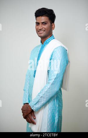 Well-dressed Indian man posing in traditional clothes Stock Photo