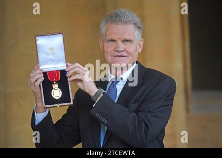 Professor Sir John Bell after being made a Companion of Honour during an investiture ceremony at Windsor Castle, Berkshire. Picture date: Tuesday December 12, 2023. Stock Photo