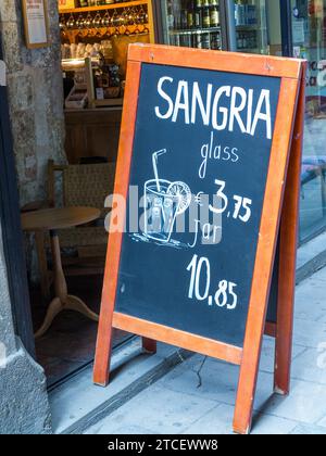 Poster advertising Sangria by the glass and in a pitcher. Barcelona, Spain. Stock Photo