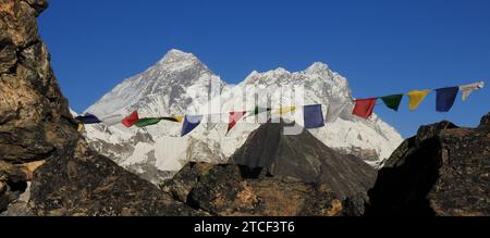 Prayer flags on Gokyo Peak and Mt Everest, Nepal. Stock Photo