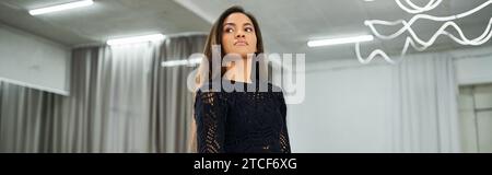 talented african american female dancer in black attire practicing in rehearsing hall, banner Stock Photo