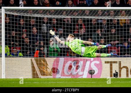 Eindhoven, Netherlands. 12th Dec, 2023. EINDHOVEN, NETHERLANDS - DECEMBER 12: Goalkeeper Aaron Ramsdale of Arsenal reacts during the UEFA Champions League Group B match between PSV and Arsenal at the Phillips Stadion on December 12, 2023 in Eindhoven, Netherlands. (Photo by Broer van den Boom/Orange Pictures) Credit: Orange Pics BV/Alamy Live News Stock Photo