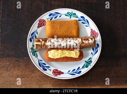 Traditional dutch fast food snacks, Kaassouffle, Frikandel Speciaal and Kroket Stock Photo
