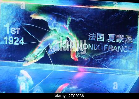 FEB 4, 2022 - Beijing, China: 24 'laser beams' sequentially carve the names of cities and countries of 23 previous Winter Olympics in Chinese and English on a LED ice-cube during the Opening Ceremony of the Beijing 2022 Winter Olympic Games (Photo: Mickael Chavet/RX) Stock Photo