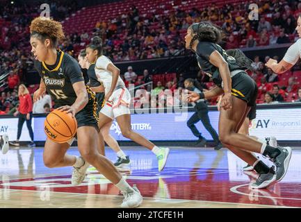 College Park, USA. 12th Dec, 2023. COLLEGE PARK, MD: - DECEMBER 12: Towson Tigers guard Kylie Kornegay-Lucas (15) starts an attack during a women's college basketball game between the Maryland Terrapins and the Towson Tigers at Xfinity Center, in College Park, Maryland on December 12, 2023. (Photo by Tony Quinn/SipaUSA) Credit: Sipa USA/Alamy Live News Stock Photo