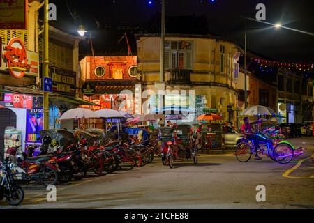 Trishaw riders waiting for business at Jalan Masjid Kapitan Keling, George Town, Penang, Malaysia Stock Photo