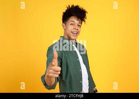 Funny stylish african american man pointing finger at camera Stock Photo