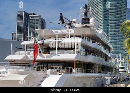 Miami, Florida, USA - 5 December 2023: Rear view of the luxury super yacht Infinity in Miami with a helicopter on the top deck. Stock Photo