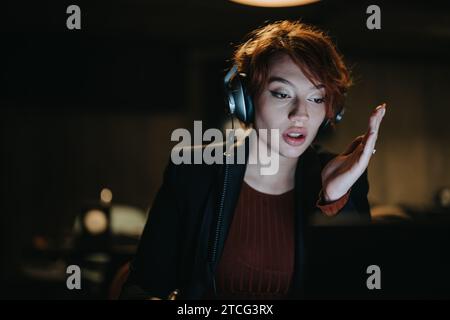 Confident businesswoman discussing data analytics for global expansion in a creative office. Stock Photo