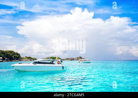 Cruise yachts and boats near the Similan Islands - most famous islands with paradise views, snorkeling and diving spots Stock Photo
