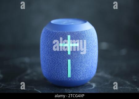 Digital Wireless Sound Speaker on black background. Stock Photo