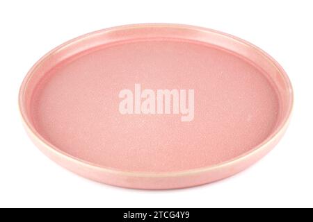 Ancient style pink empty plate isolated on white background. Stock Photo