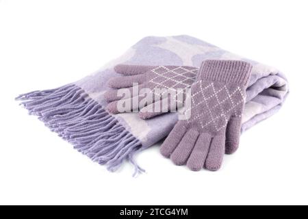 Pink winter scarf and gloves isolated on white background. Stock Photo