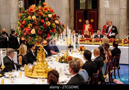 King Willem-Alexander and Queen Maxima of The Netherlands, President Yoon Suk Yeol and Mrs. Kim Keon Hee at the Royal Palace in Amsterdam, on December 12, 2023, to attend the State-Banguet, on the 1st of a 2-day state visit from South Korea to The Netherlands Photo: Albert Nieboer/Netherlands OUT/Point de Vue OUT Stock Photo