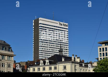 View of 'The Hotel' modern hotel building as seen from Poelaert square in the city centre of Brussels Stock Photo