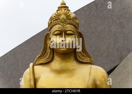 hindu god lord hanumana in meditation isolated statue with bright background at morning image is taken at The Statue of Belief or Vishwas Swaroopam na Stock Photo