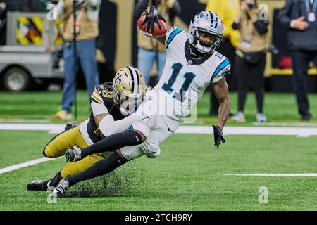 New Orleans, Louisiana, USA. 10th Dec, 2023. (left to right) New Orleans Saints cornerback Lonnie Johnson Jr. tackles Carolina Panthers wide receiver Ihmir Smith-Marsette in an NFL regular season game in New Orleans, Louisiana USA. The Saints beat the Panthers 28-6. (Credit Image: © Dan Anderson/ZUMA Press Wire) EDITORIAL USAGE ONLY! Not for Commercial USAGE! Stock Photo