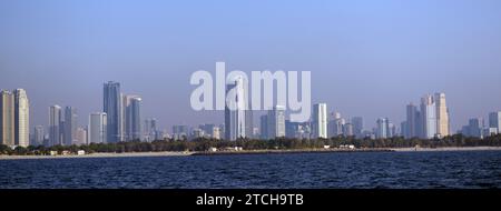 The modern skyline along the corniche of the Al Khan Lagoon  in Sharjah, UAE. Stock Photo