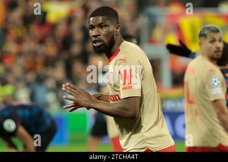 Lens, France. 12th Dec, 2023. Kevin Danso of Lens during the UEFA Champions League, Group B football match between RC Lens and Sevilla FC on December 12, 2023 at Bollaert-Delelis stadium in Lens, France - Photo Jean Catuffe/DPPI Credit: DPPI Media/Alamy Live News Stock Photo