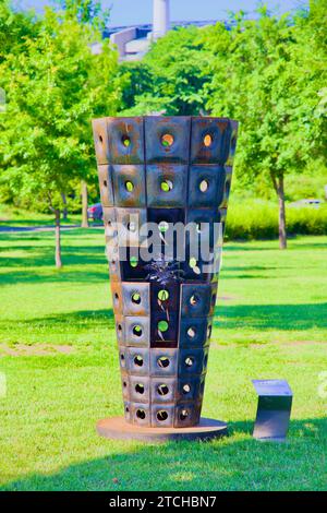Seoul, South Korea - June 2, 2023: A striking three-meter-tall metal vase artwork, part of the Han River "Heung" Project, graces the lawns of Jamsil H Stock Photo