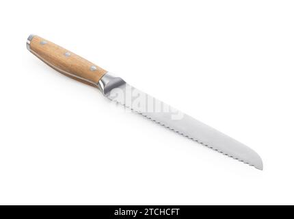 Bread knife with wooden handle placed on white background. Stock Photo