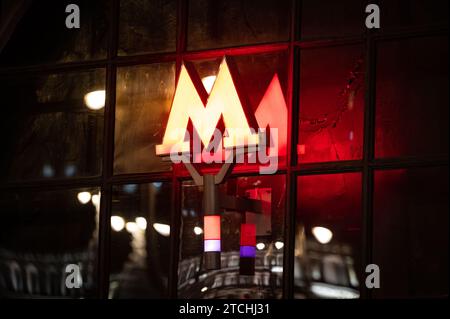 A big red letter M on the facade of the building city subway in Moscow. Symbol of the Moscow Metro designation Stock Photo