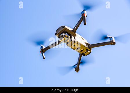 Graz, Austria 15.03.2020, DJI Drone Mavic 2 Pro with Hasselblad camera flying against blue sky. Copy space Stock Photo