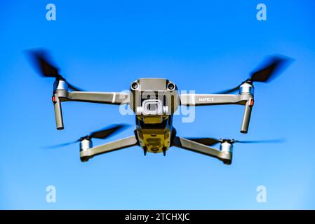 Graz, Austria 15.03.2020, DJI Drone Mavic 2 Pro with Hasselblad camera flying against blue sky. Copy space Stock Photo