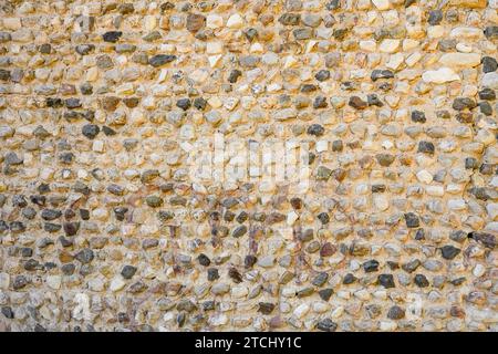 Historic old wall made of stones. Natural background. Stock Photo