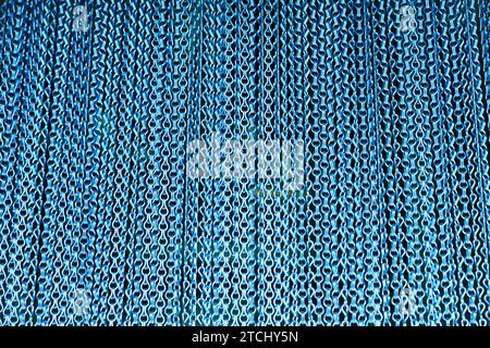 Blue metal chain curtain close-up Stock Photo