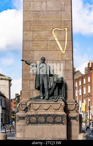 Bronze statue of Charles Stewart Parnell by sculptor Augustus Saint-Gaudens in O'Connell Street, Dublin city center, Ireland Stock Photo