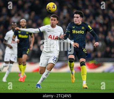 London, UK. 10th Dec, 2023 - Tottenham Hotspur v Newcastle United - Premier League - Tottenham Hotspur Stadium.                         Tottenham's Brennan Johnson battles with Newcastle's Tino Livramento. Picture Credit: Mark Pain / Alamy Live News Stock Photo