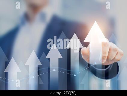 Financial chart showing growth. Growing revenue and profit. Person touching chart with arrows pointing up. Successful business plan or strategy, good Stock Photo