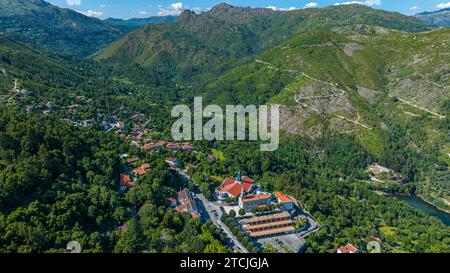 An aerial view of the picturesque town surrounded by green mountains. Geres, Portugal Stock Photo