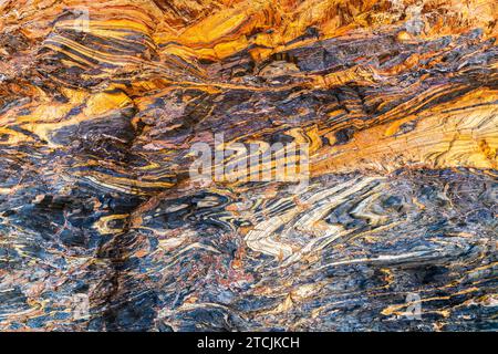 Natural marble stone background with cracks and colourful layers in Second Valley, South Australia Stock Photo